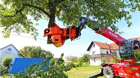 tree cutting attachments for excavators